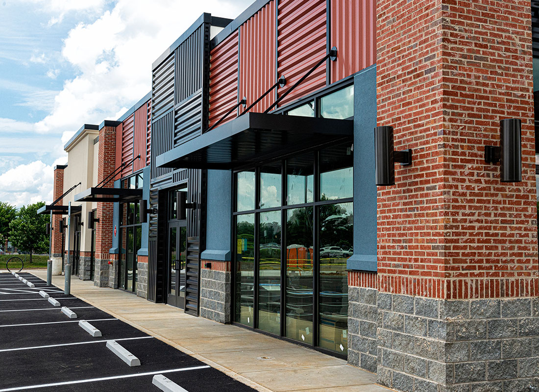 Business Insurance - Frontal View of a Newly Constructed Brick Commercial Building